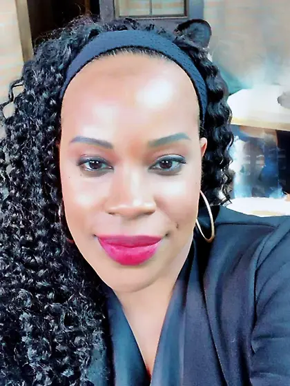 Shalanda tried to hide her face while flashing