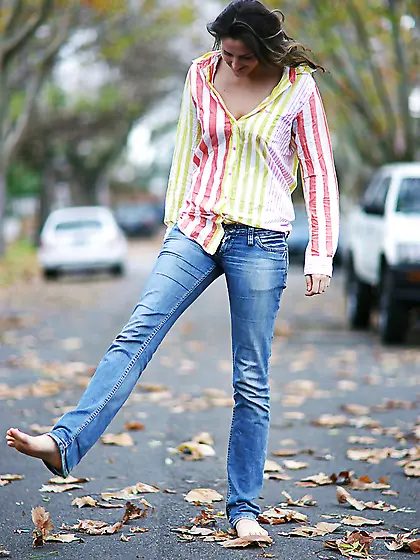 Leggy and tall looking brunette Barbamiska strips while in publi