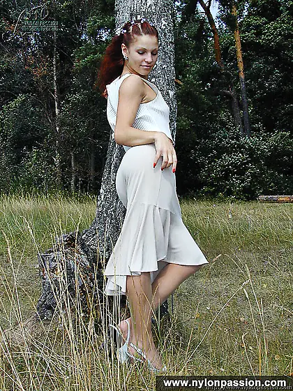 Pantyhose teen girl posing in nylon outdoor