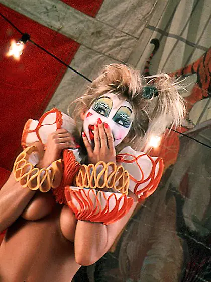 Sexy blonde clown shows