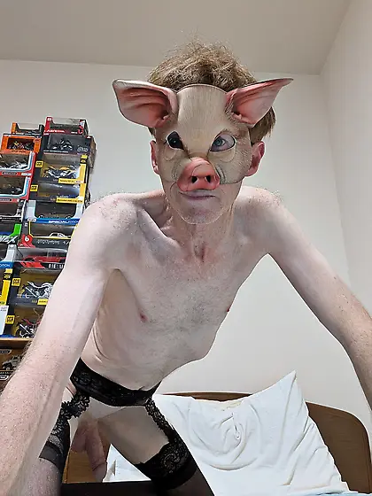 Me wearing various kink masks and fox tail butplug