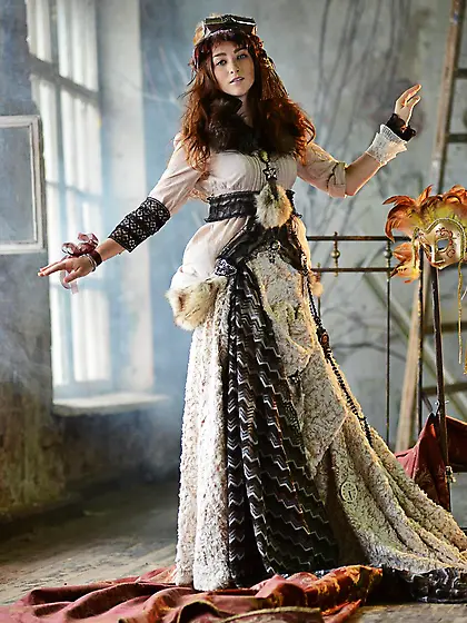 Ruzanna A is a naughty redhead babe who loves crazy outfits and