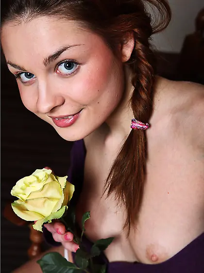 Guerlain A got undressed and sit on chair with yellow rose and n