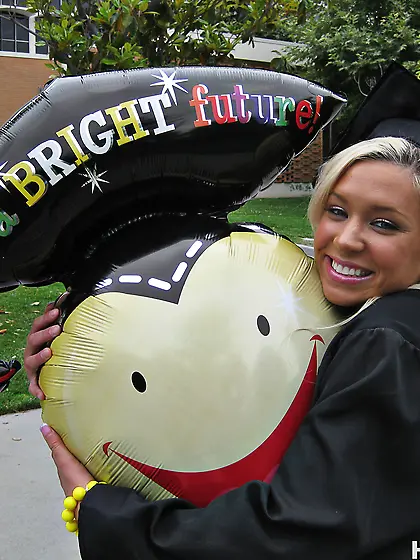 Kacey graduates high school