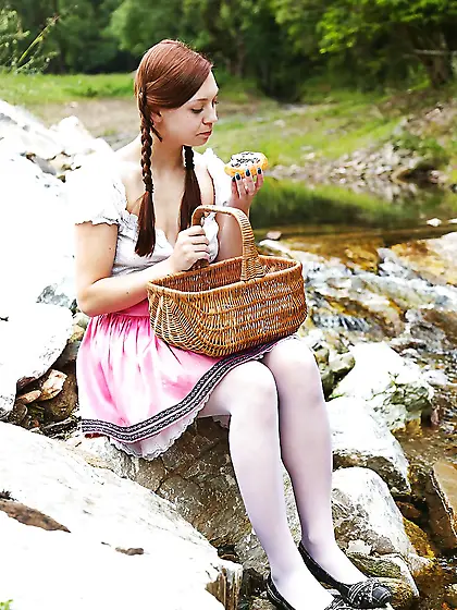 Girl with two pigtails has big dildo in ped for self-satisfactio