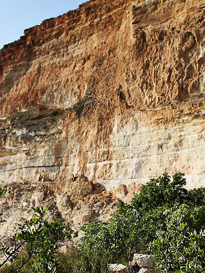 Horny bimbo Divina A climbs the rock and strips showing off the