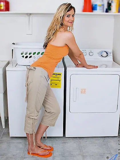 Lewd blonde milf Nicole Logan stretching pussy lips as widely as